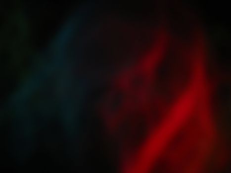 Blue and Red Abstract Background with swirls of light and plenty of copy space.

