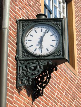 vintage clock outside a building