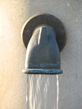 water tap with fresh water running