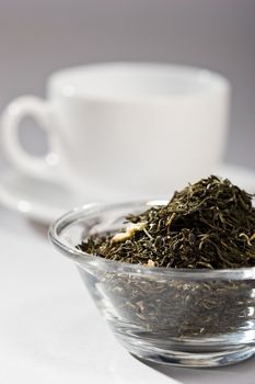 still life with tea leaves on the glass