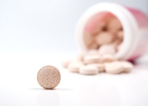 Tablets  ,Pills Spilling out of Pill Bottle closeup