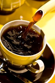 drink series: black coffee pouring into cup