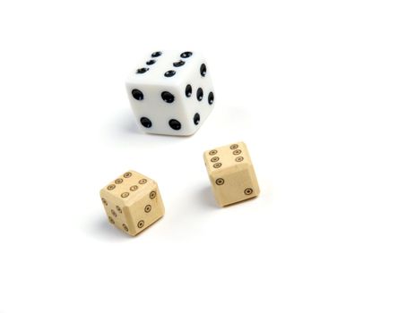 three  dice on a white background Close-up 