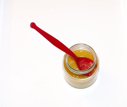 food on glass with spoon