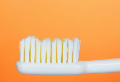 Toothbrush, orange background