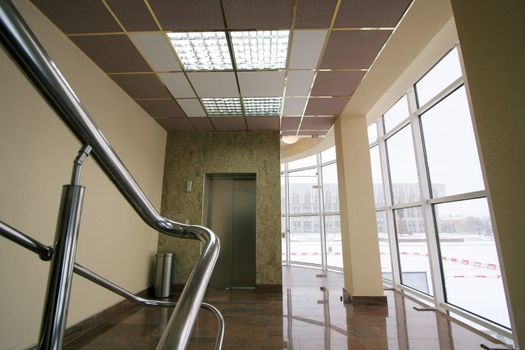 The lift and the big window in modern hotel