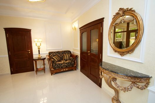 Beautiful room with a mirror in modern hotel