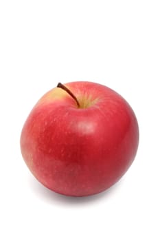 Ripe red apple on a white background
