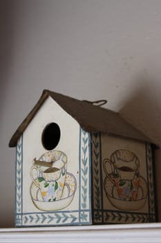 Close up of a small bird house.