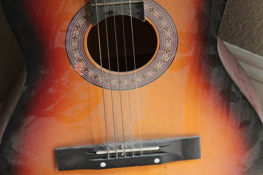 Close up of an Antique Classic Guitar.