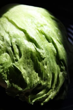 Close up of a lettuce on a plate.