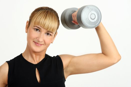 The girl, the instructor shows different exercises