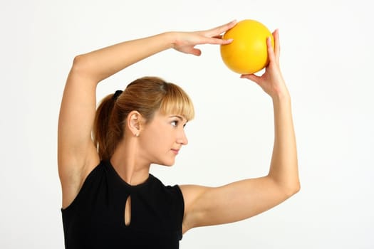 The girl, the instructor shows different exercises