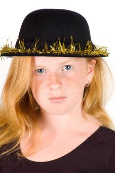 girl is wearing a black hat with golden streamer isolated on white