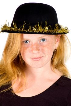 girl is wearing a black hat with golden streamer isolated on white