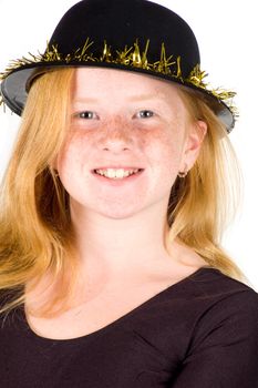 girl is wearing a black hat with golden streamer isolated on white