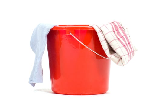 red bucket with cleaning tools  isolated on white
