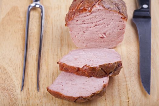 baked bavarian meat loaf on a wooden desk