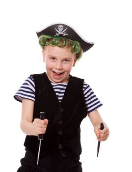 Boy wearing pirate costume holding knifes isolated on white