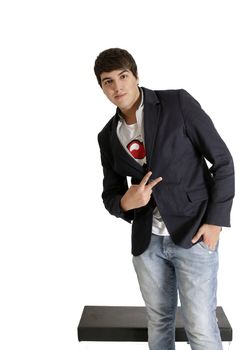 Young teenager male in studio, brown hair, white background