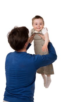 Happy father holding one years son back view isolated