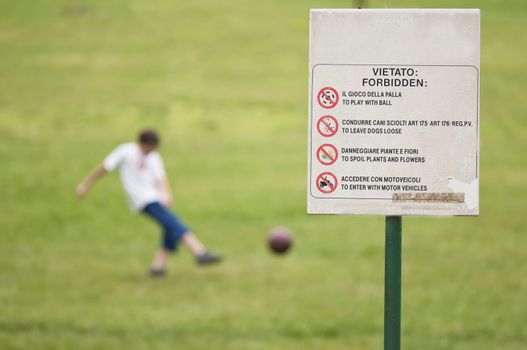 Violating the forbiden actions expressed on sign
