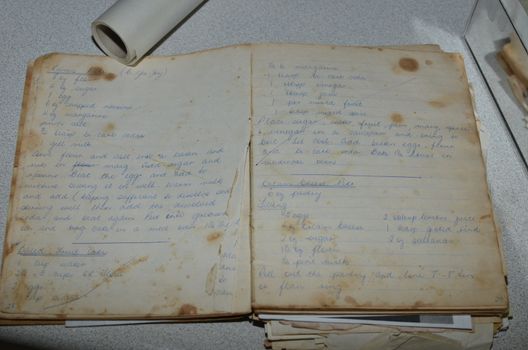 Well used hand written recipe book.