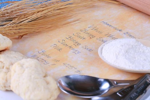Baking concept, with recipe, flour, rolling pin, wheat
