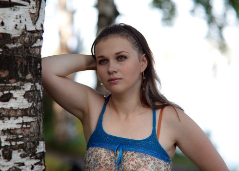 Portrait young beautiful girl on the nature