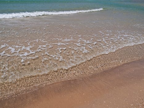 Beautiful beach with clear water and golden sand background