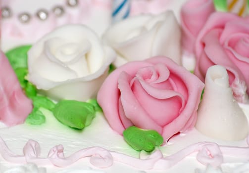 Sweet decorative whipped cream rose on torte 