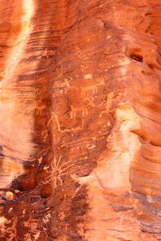 Strange petroglyphs on a rock wall at Valley of Fire State Park in Nevada.