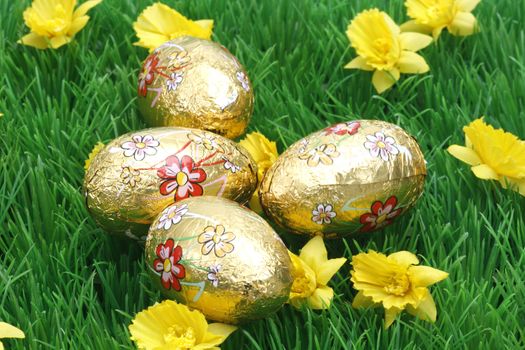 Chocolate easter eggs on grass