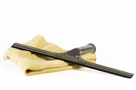 Utensils for cleaning windows over white background