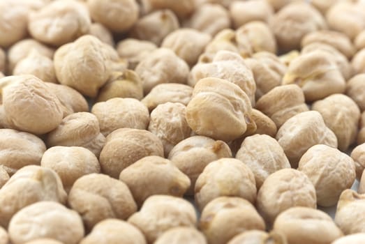 Close-up (macro) of chickpeas (garbanzo beans) filling whole frame.