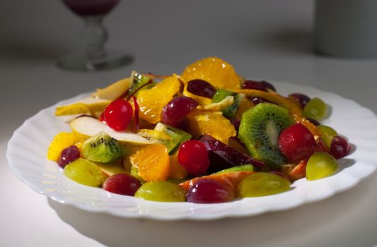 salad with fruit and berries on a plate