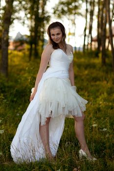 bride in white dress on the nature