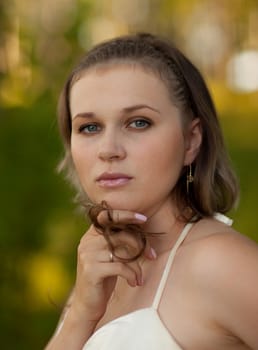 Portrait young beautiful girl on the nature