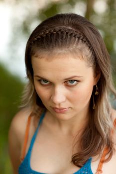 Portrait young beautiful girl on the nature