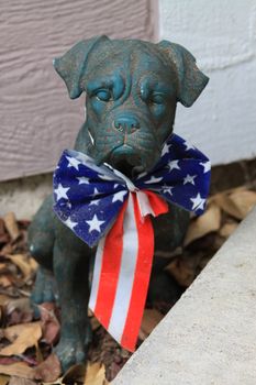 Close up of a Boxer Dog Statue.