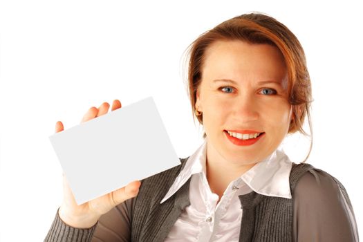 Young woman holding a blank card. She's smiling.
