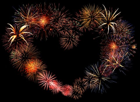 Big beautiful valentine day greeting heart made of colourful fireworks