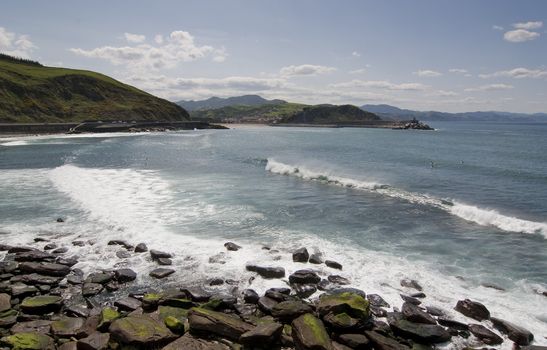 image of people practicing surf in the beach