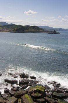 image of people practicing surf in the beach