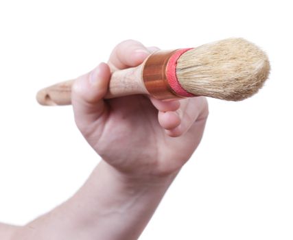 hand holding a painting brush isolated on withe background