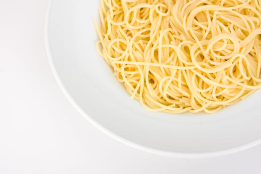 spaghetti in a white plate on clear background