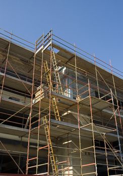 Scaffold on new building shot from below