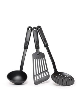 Set of black modern kitchen utensil standing on white background