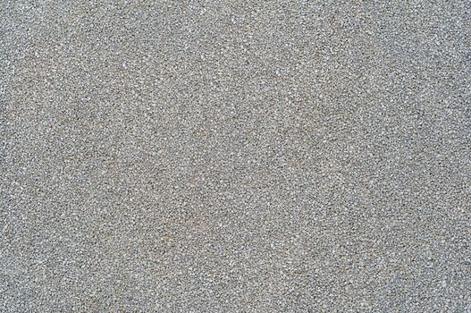 Decorative pavement surfacing made from a stone crumb