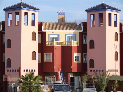 Pink and Terracotta Buildings by Port